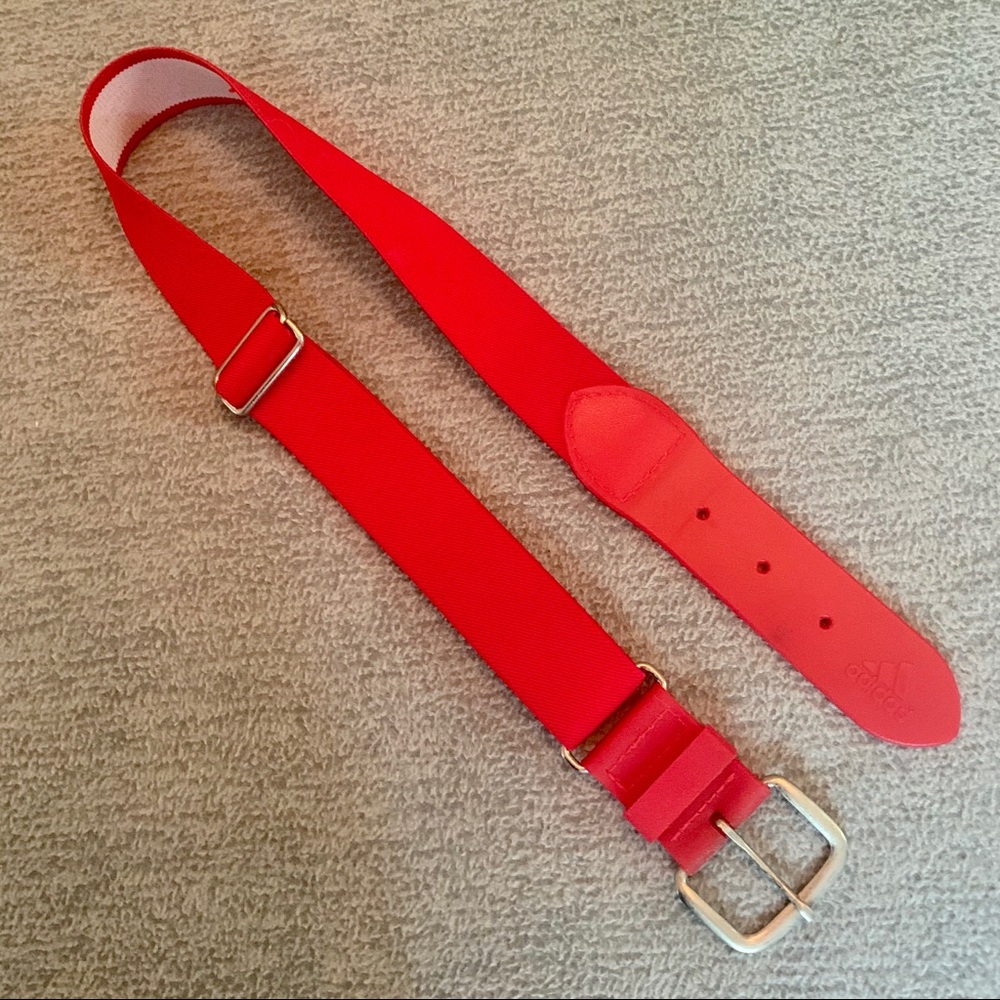 Adidas red adjustable baseball belt.